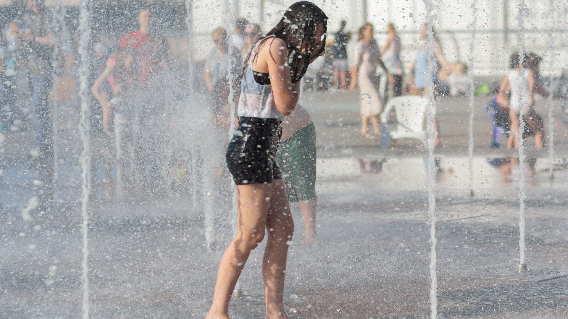 Girl in fountain